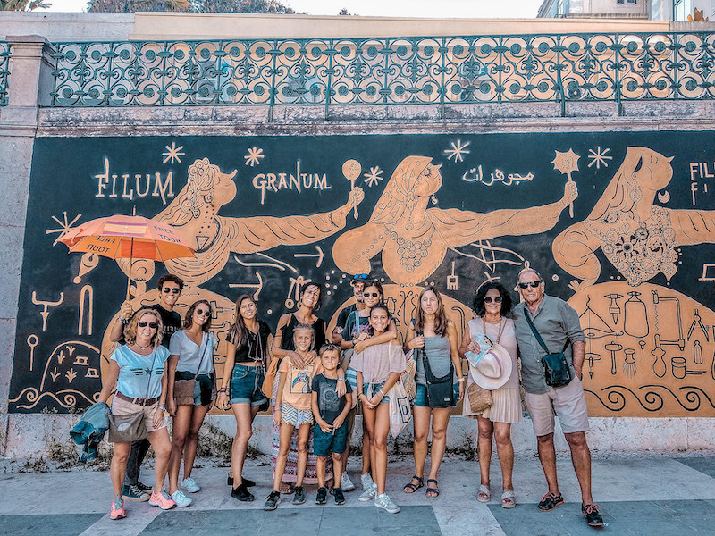 Free Lisbon Walking Tour Group in front of mural
