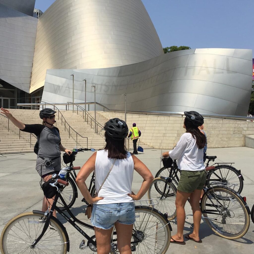 Bike tour stop in front of Walt Disney Concert Hall in Los Angeles