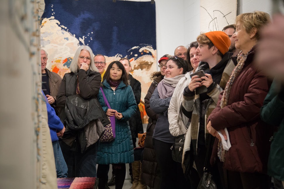crowd looking at exhibition at DesignTO winter toronto festival
