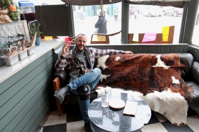 anthony rose posing at new toronto restaurant gordy smiles