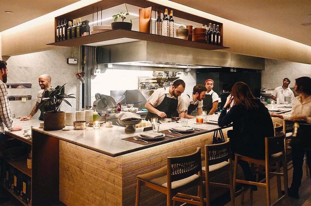 giulietta toronto restaurants chefs behind bar with customers